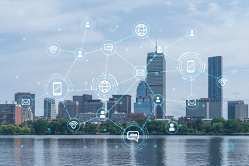 Panorama skyline, city view of Boston at day time, Massachusetts. Financial downtown. Glowing Social media icons. The concept of networking and establishing new business connections between people
