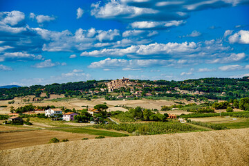 Fototapeta na wymiar Panorama on the Tuscan countryside in the background the village of Casale Marittimo Tuscany Italy