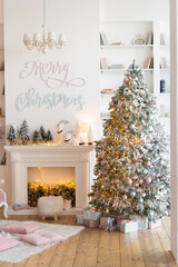 Christmas background,  pine branches festive background. Creative composition with border and copy space. Christmas decoration with bokeh lights from light bulbs