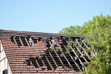 Old half-timbered house after the extinguished fire