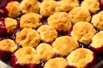 Sweet homemade berry cobbler. Crumble berry cake or sonker.