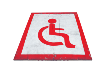 Wheelchair symbol in a disabled parking lot old icons red color and white backgroundon , which ideal for use in the design