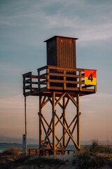 lifeguard tower at sunset