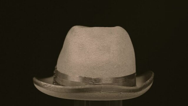 footage of hat dark background