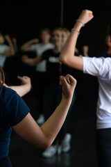 Young people dancing in a dark room....