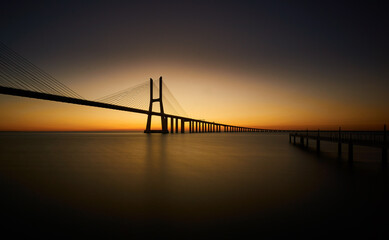 Fototapeta na wymiar Vasco da Gama Bridge in Lisbona, Portugal, at sunrise