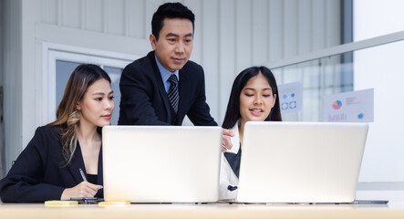 Group of young business people working together in modern office, Business colleague discussing or in mentoring with manager