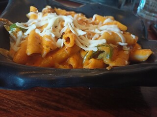 Pasta in black dish