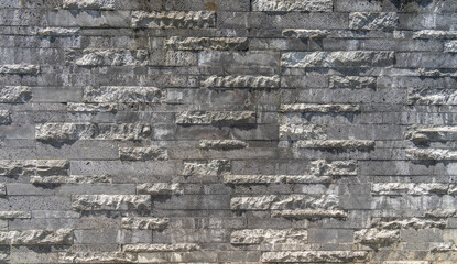 Grey brick wall texture old stone background masonry  rough.