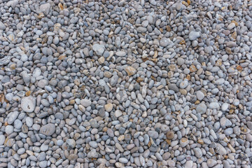 texture of grey stones from a beach