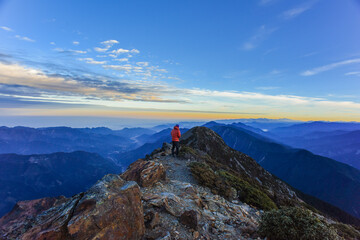 Fototapeta premium Landscape View of Yushan Main Peak And Tongpu Valley From the North Peak of Jade Mountain At Sunrise, Yushan National Park, Chiayi Taiwan