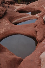 pools of water in red rock