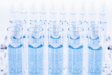 Laboratory test tubes with a blue solution.