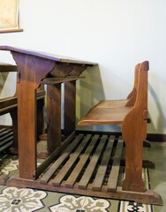 Fototapeta na wymiar Empty wooden desk of an old school