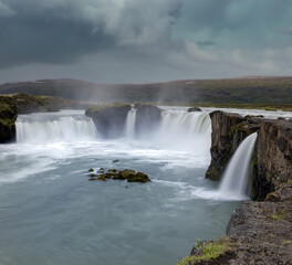 Goðafoss waterfall in northern Iceland, located along the country's main ring road. The water of the river Skjálfandafljót falls from a height of 12 metres over a width of 30 metres.