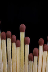 close-up matchsticks on black background