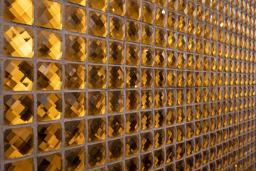 テクスチャ―　メタリックな金色のタイル　texture of golden sqare tiles