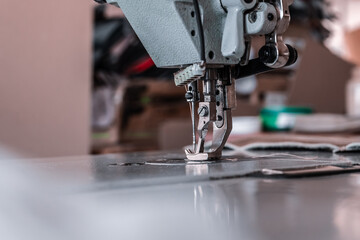 Sewing machine needles close-up in the workshop