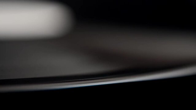 Vinyl record player. Shooting in motion as a background.