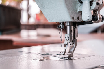 Sewing machine needles close-up in the workshop
