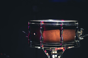 Close-up, snare drum on a dark background isolated, copy space.