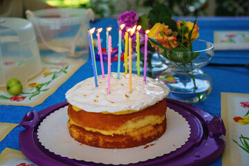 Birthday cake with candles. Sweet dessert for a party.
