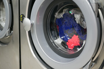  close up of cloths in a washing machine.