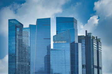  singapore city buildings against blue sky 