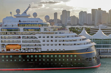 Disney Family cruiseship or cruise ship liner Wonder or Magic during sunset and twilight in port of...