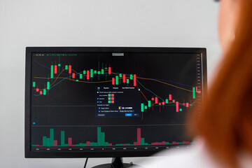 Business Woman Checking Stock Chart Display