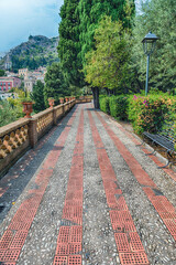 Walking in the beautiful public garden of Taormina, Sicily, Italy