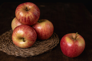 Still life of apples of the Royal Gala variety, reddish and yellow.