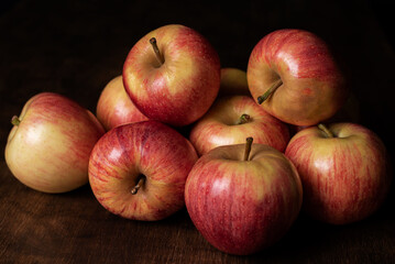 Still life of apples of the Royal Gala variety, reddish and yellow.