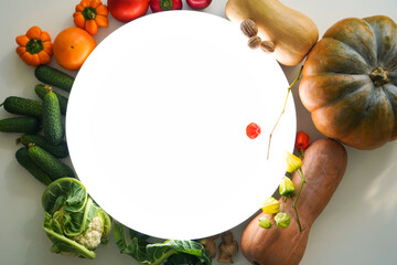 Large glowing circle surrounded by raw vegetables in beautiful lighting, perfect cover for a seasonal menu