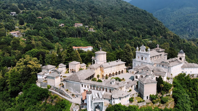 BIELLA, ITALY - JULY 7, 2018: aero View of beautiful Shrine, ancient temple complex, big castle, sanctuary located in mountains near the city of Biella, Piedmont, Italy. summer. High quality photo