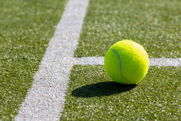 tennis background  Close-up shots of tennis balls in tennis courts With a mesh as a blurred...