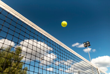 tennis background Close-up shots of tennis balls in tennis courts With a mesh as a blurred...