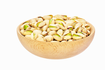 Pistachios nuts in wooden bowl isolated on white background.
