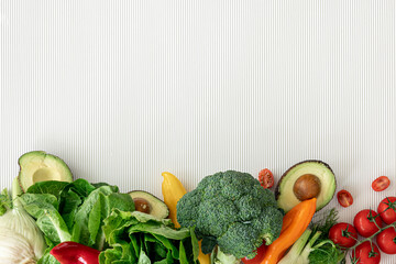 Organic fresh vegetables on white background, flat lay.