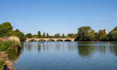 Fototapeta na wymiar The bridge over the Serpentine lake in Hyde Park, London