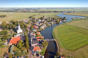 Aerial from the traditional village Oosthem in Friesland the Netherlands