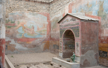 Paintings and mosaic on Ruins of the ancient city of Pompeii, ancient Roman city covered by the eruption of the volcano Vesuvius