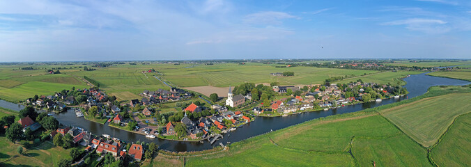 Aerial panorama from the traditional village Oosthem in Friesland the Netherlands