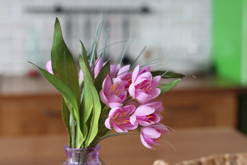 flowers in a vase on the table