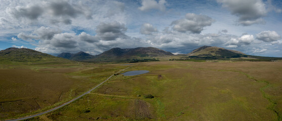 panorama landscape of Connemara National Park and the Twelve Bens mountains in western Ireland