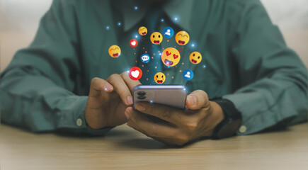 man hand using smartphone to play social media or digital platforms, concepts online communication technology, surfing online, exchanging ideas Through the Internet, working remotely at home