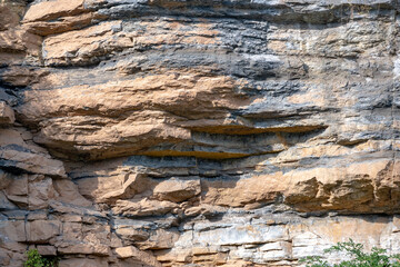 stone wall background in the sun