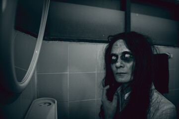 Portrait of asian woman make up ghost,Scary horror scene for background,Halloween festival...
