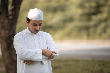 Asian islam man prayer,Young Muslim praying,Ramadan festival concept