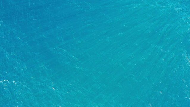 Aerial Backward Shot Of Full Frame Of Wavy Blue Sea - Exmouth, Australia